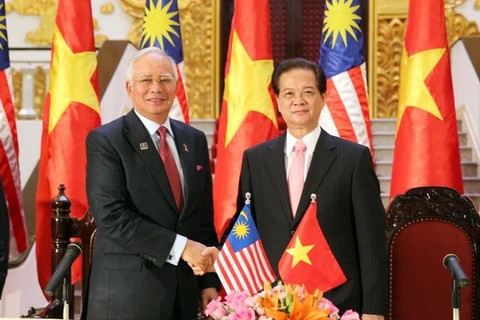 Le PM Nguyen Tan Dung et son homologue malaisien Najib Tun Razak. (Photo: Duc Tam/VNA)